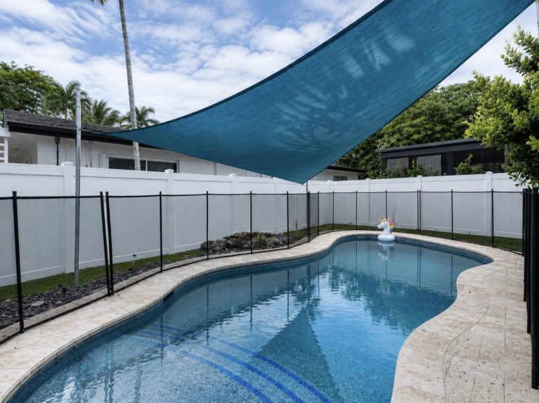 Pool with sunshade and safety fence