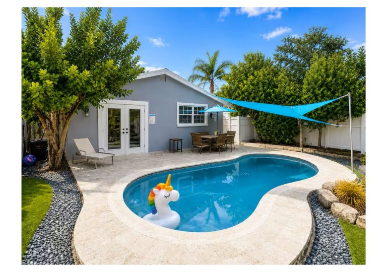 Private outdoor pool to beat the heat under the sunshade.