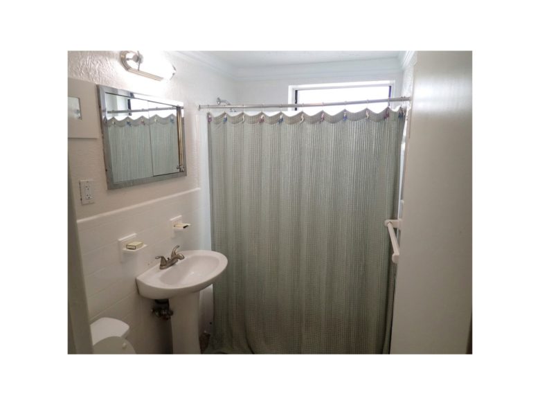 Guest bathroom with refinished tub and shower