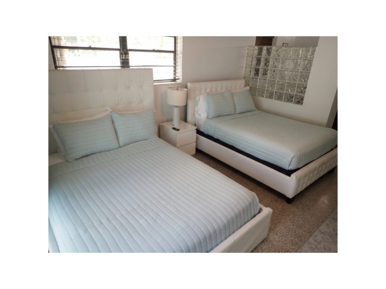 Master bedroom with a Queen bed and Full Bed plus private bathroom all within the master bedroom.