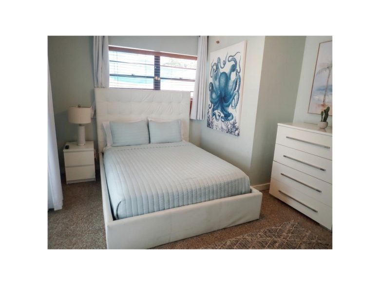 Guest bedroom with queen bed and fresh new linen