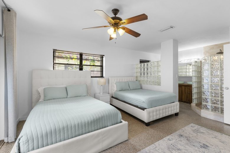 Master Bedroom 2 Beds and open concept private bathroom